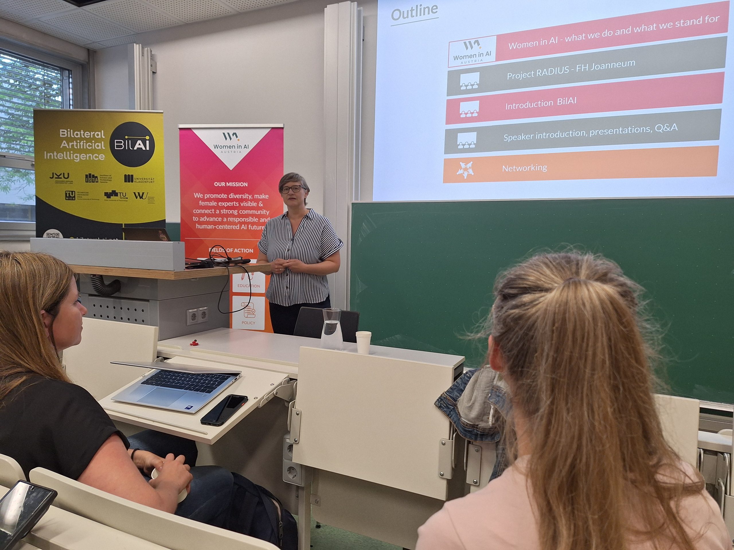 Isabella Danda welcoming the audience to the event Women in AI on the June 17 2026.